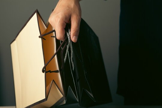 man holding shopping bag .