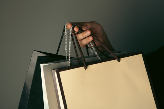 man holding shopping bag .