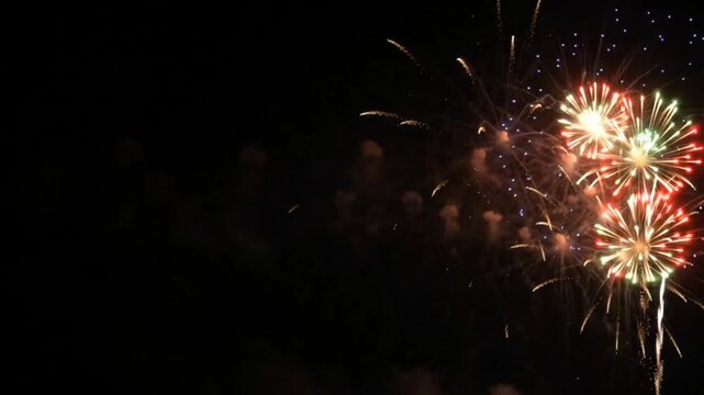 Colorful fireworks on edge with empty copy space 
