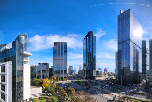 Skyscrapers against a blue sky around Rondo Daszynskiego in Warsaw&rsquo;s modern business district, symbolizing Poland&rsquo;s economic growth and urban development.