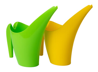 Colorful watering cans in green and yellow standing side by side © fotofabrika