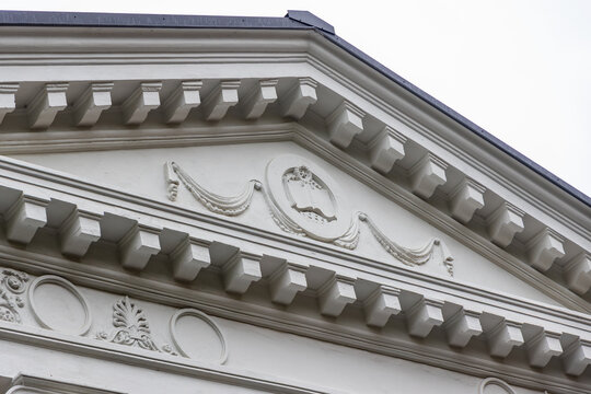Peredelkino, Russia - September 23, 2026: Architectural detail of pediment relief on Peredelkino House of Creativity building