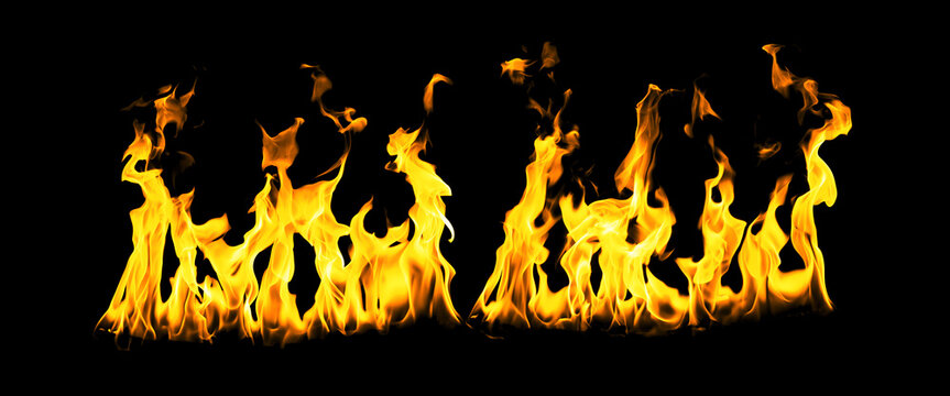 Bright orange and yellow flames isolated on a black background, creating a dramatic fire effect for energy, heat, burning, danger, destruction, overlays, advertising, design, and creative projects.