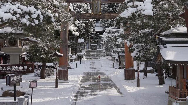 The historic Sakurayama Hachimangu Shrine blanketed in snow during winter in Takayama, Hida region, Gifu, Japan.