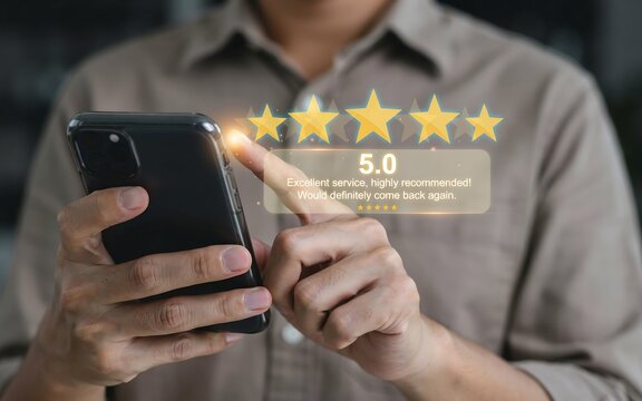 Customer holding smartphone and touching five star rating review with positive feedback hologram