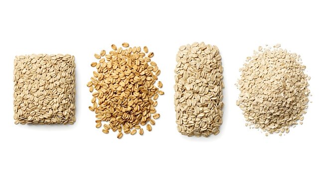 Various raw oat groats and flakes arranged in piles and rectangles