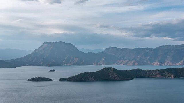 Scenic View of Lake Atitlan and Volcanic Mountains in Guatemala Under Cloudy Sky in Lake Atitlan, Guatemala