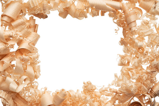 Wood shavings form a frame around a blank space for creative projects in a workshop setting