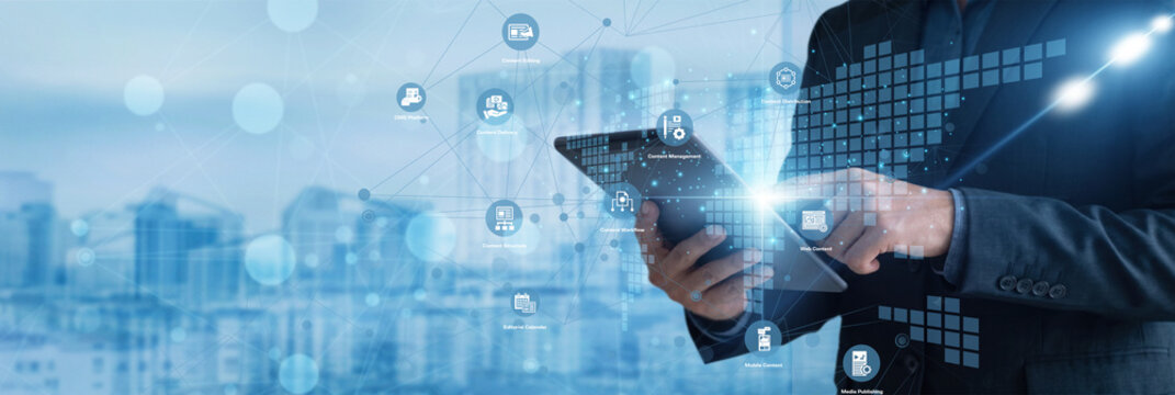 Web publisher using digital pad. Touching the Tablets screen to update Content Management portals. Media distribution network and structured digital publishing system.