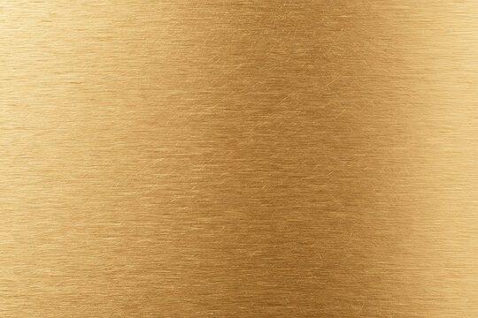 Brushed gold metal surface texture with scratches background