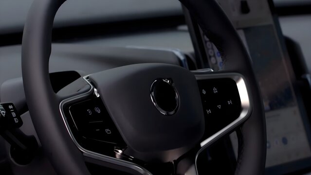 View of the modern steering wheel and dashboard interior of a Volvo vehicle at Auto Industriale Bergamasca S.p.A. in Dalmine, Lombardia, Italy.