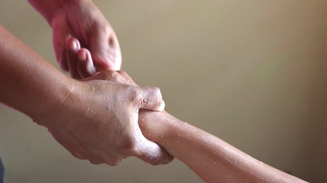 A traditional Thai massage with cosmetic body scrub cream