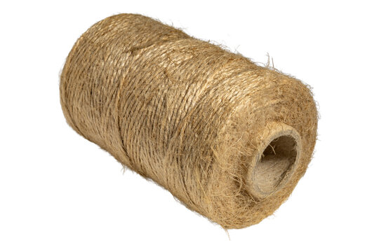 Natural jute fiber rope spool with hollow cardboard core closeup