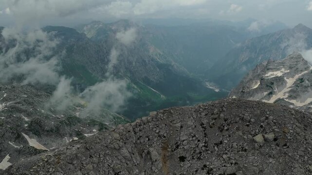 Aerial Approach Over Snowy Jezerca Mountain Valley Albania