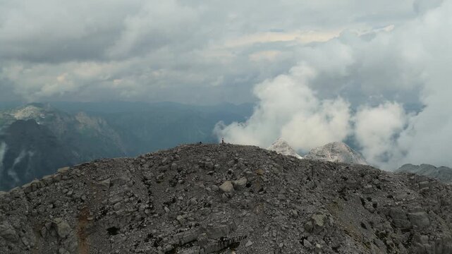 Rocky Summit Ridge Near Jezerca with Two Hikers in Albania