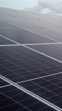 Solar Farm panels tracking shot long row of solar energy capture technology