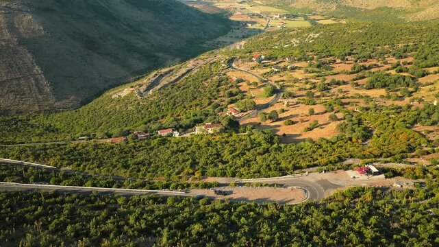 Rising Aerial Reveal of Mountain Valley Roads in Kastrat Albania