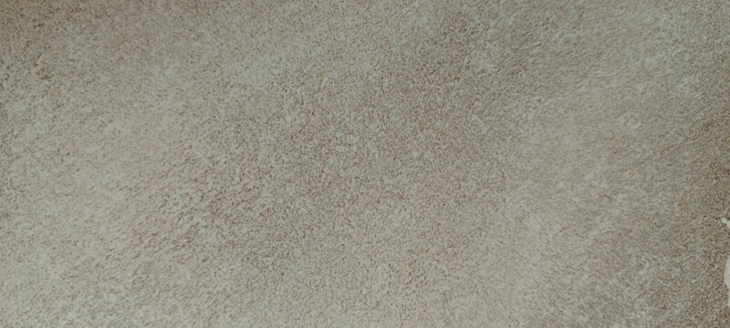 Soft grey suede texture background, neutral microfiber fabric surface, matte felt material close up, minimalist textile backdrop for design