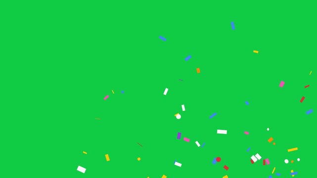 Colorful confetti explosion falling against a solid green screen background.
