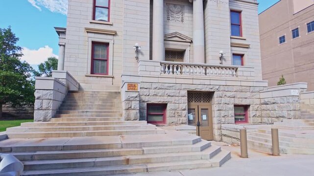 Chaffee County granite facade and ionic columns frame the historic municipal center of Colorado Springs
