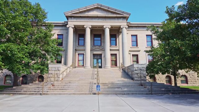 Chaffee County granite facade and ionic columns frame the historic municipal center of Colorado Springs