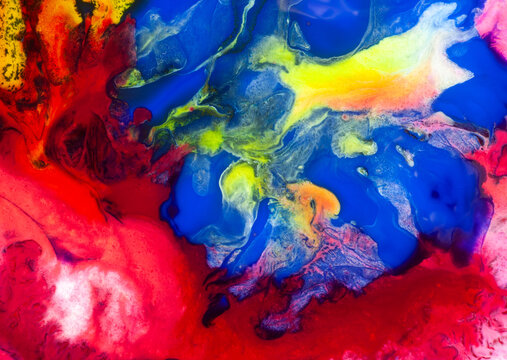 Bright colors swirl in abstract patterns on a canvas