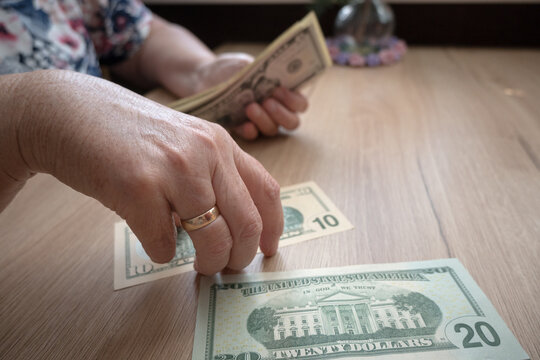US dollars; the difficult financial situation of an elderly couple.
