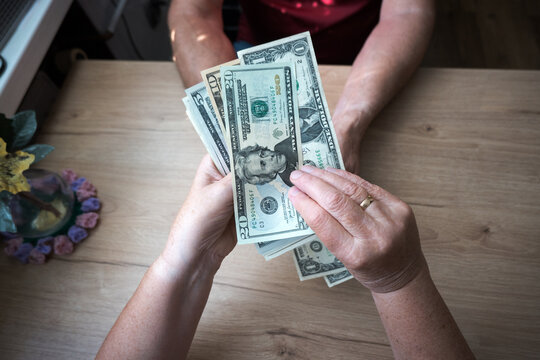 US dollars; the difficult financial situation of an elderly couple.
