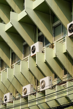 Air Conditioners on Geometric Building Facade
