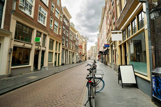Narrow Street With Shops and Bicycles