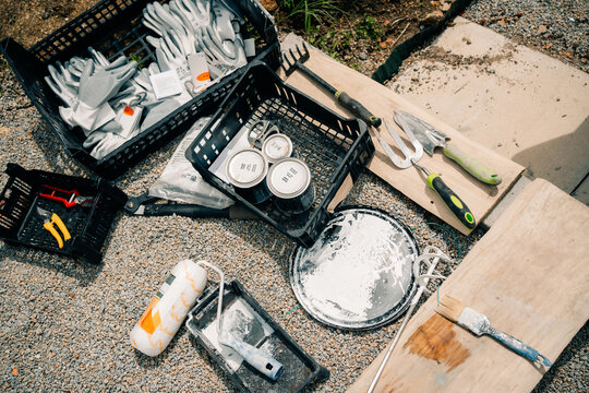 Tools and Materials Scattered on Ground During Outdoor Project