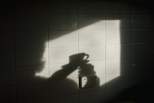 Cup shadow on the wall