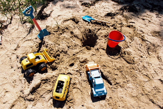 Kids sand toys on beach