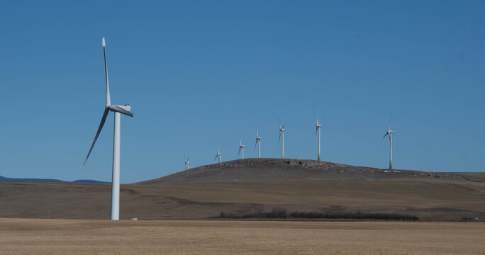 Wind turbines on a wind Farm in a rural prairie landscape, Pincher Creek, Alberta, Canada