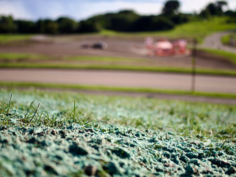 Close Up of Hydroseeding Mulch Covering Grass and Soil and landscape.