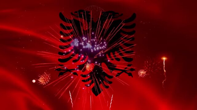 Albania flag waving with black double headed eagle and fireworks exploding behind, seamless loop realistic fabric animation on dark night background wallpaper