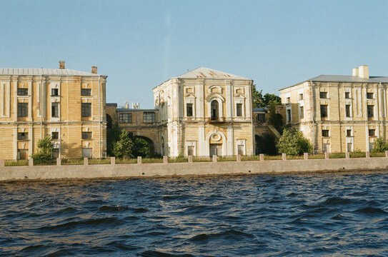 Waterfront View of Old Buildings Along a River