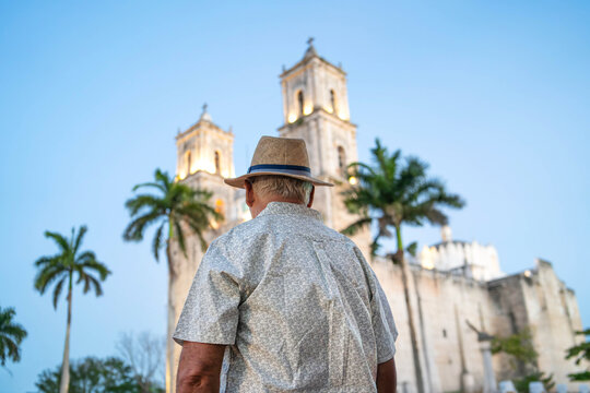 Older Tourist Looking at a Church in M&eacute;rida, Yucat&aacute;n