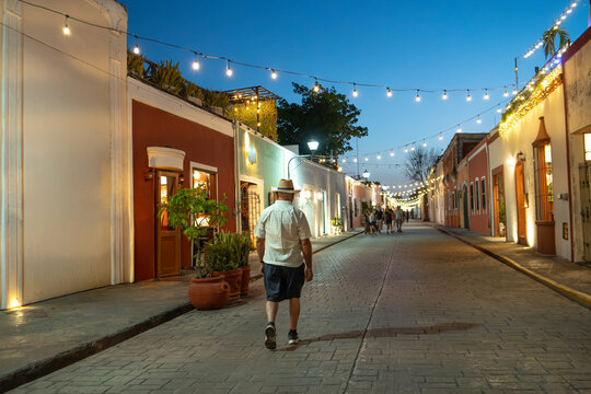 Older Tourist Man Wearing a Hat Walking on a Street in M&eacute;rida, Yucat&aacute;n