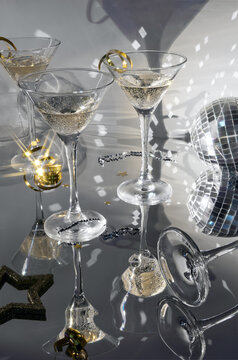 Celebration Glasses With Sparkling Drink and Festive Decorations
