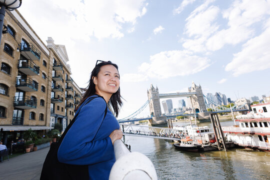 Filipina woman smiling enjoying London cityscape