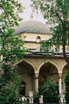 Mosque Courtyard Through Trees