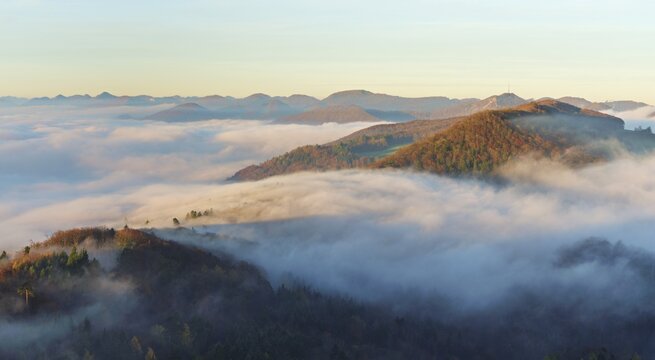 View from the Gisliflue of the Jurassic foothills covered in fog with the water fluh in the morning light, Talheim, Canton, Aargau, Switzerland