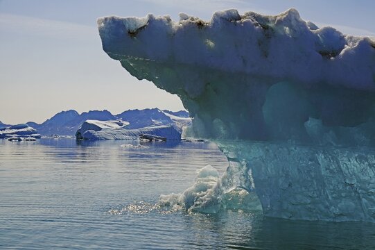 Bizarre iceberg on a fjord, silence, stillness, barren landscape, ice fjord, East Greenland, North America, Tiniteqilaaq, Tasilaq, Arctic, Greenland, Denmark