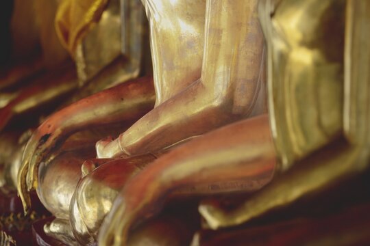 Gilded Buddha statues (Bhumispara-mudra: Gautama Buddha at the moment of enlightenment), Wat Suthat Thepwararam, Royal Temple, Phra Nakhon, Bangkok, Thailand