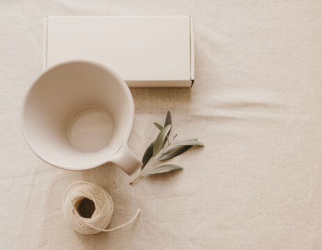 Single ceramic cup flat lay with plain box, Cyber Monday product styling