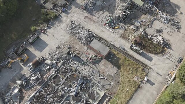Destruction sprawls across concrete. Industrial, demolition, Dewsbury