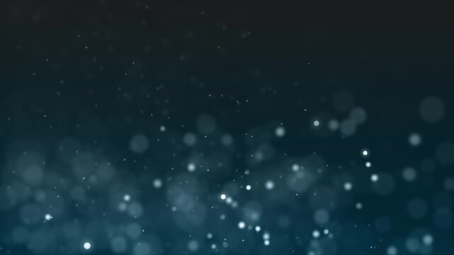 Floating white particles and glowing blue bokeh light orbs drifting against a dark gradient background with composition