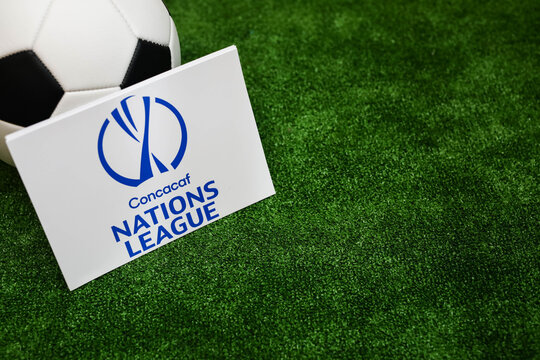 A soccer ball and the official Concacaf Nations League logo on the grass. 2 October 2026 . Minsk, Belarus.