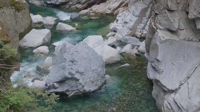 Turquoise River Flows Through Rocky Canyon at Othello Tunnels Near Hope, British Columbia